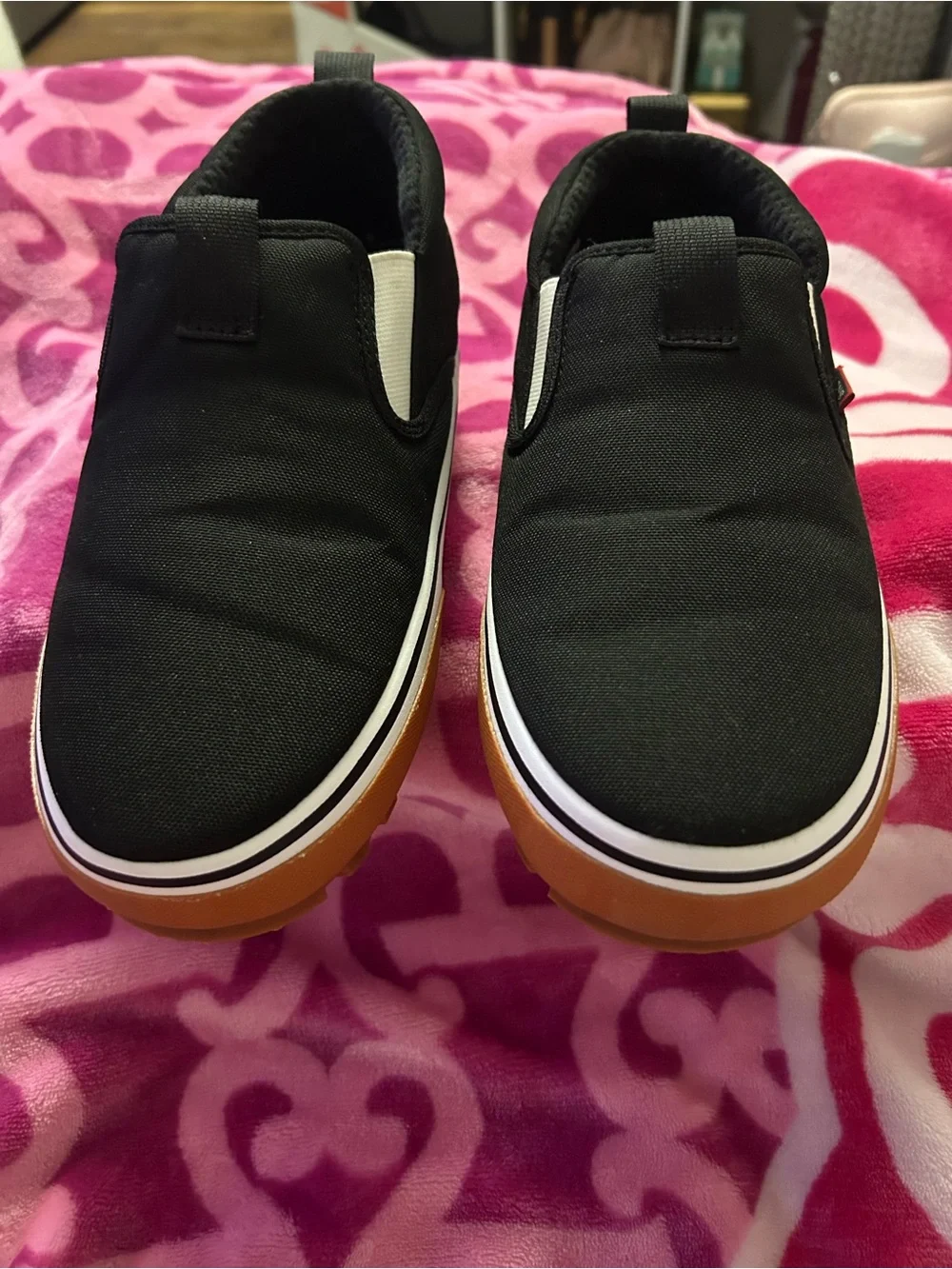 Vans Black Slip-On Sneakers with White Midsole and Gum Outsole